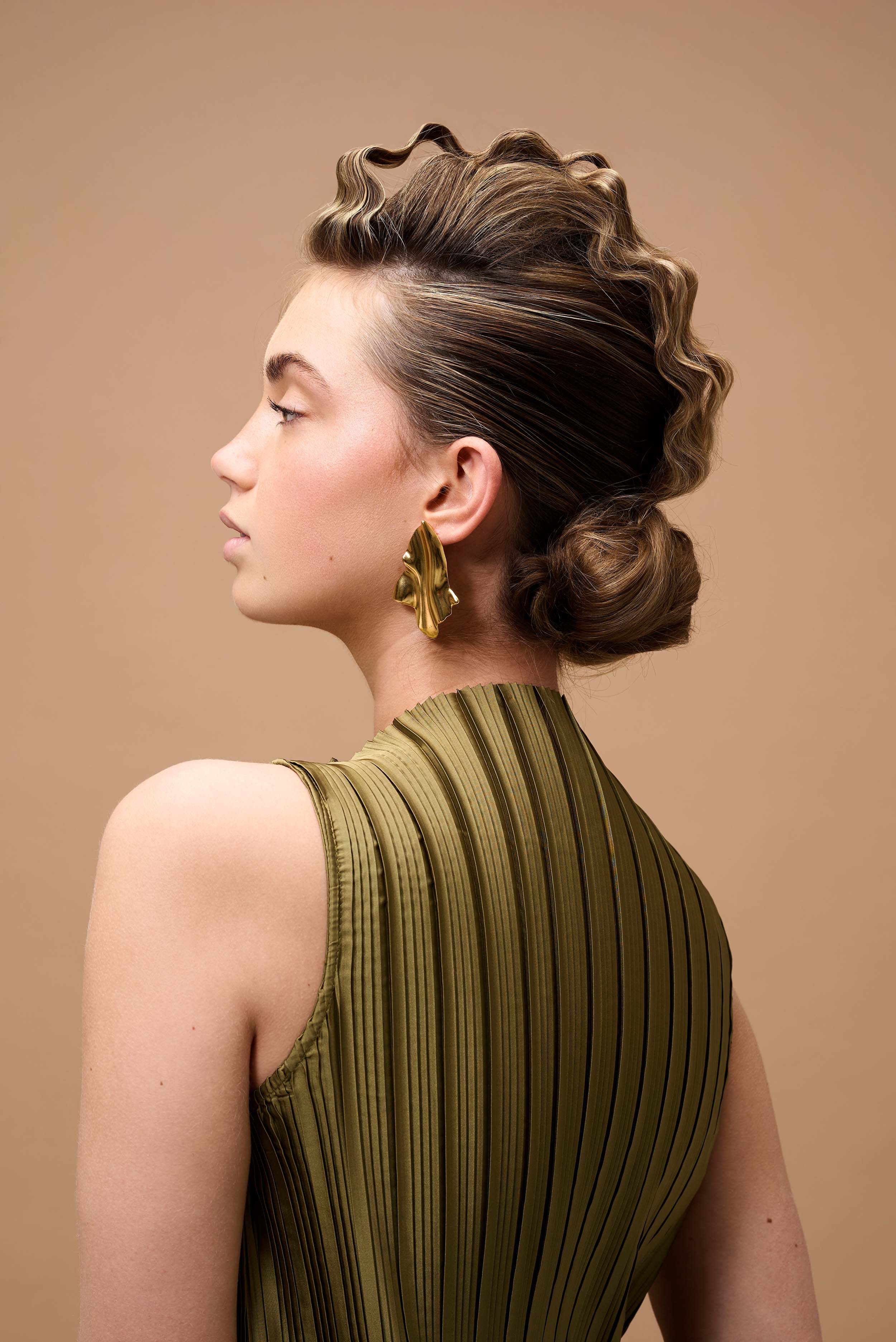 Hair photography for Reggy - creative hairstyle with side view and artistic presentation